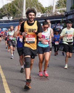 Richi Edwards running in a Born Free vest